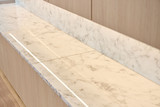 Kast op maat met afwerking in lichte marmerlook